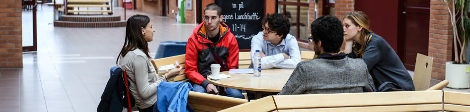 students discussing hall